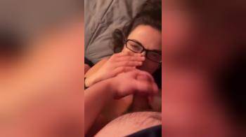 video of Brunette In Glasses Gets Facialized