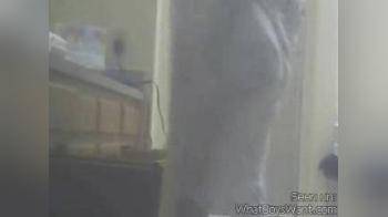 video of bathroom spycam disrobe