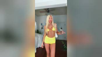 video of yellow bikini platinum blonde
