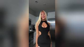 video of tight short black dress