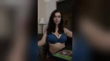 video of Busty brunette in blue bra