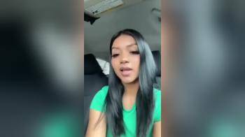 video of Hot brunette in car