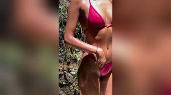 video of tanned beauty in bikini
