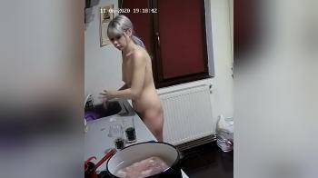 video of some dish washing naked