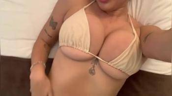 video of teasing her big tits
