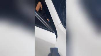 video of Unaware upskirt when getting down the car