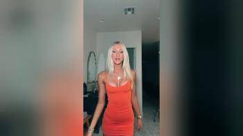 video of blonde in tight dress