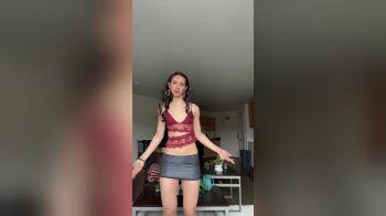video of tall girl tiny skirt