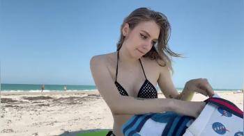 video of Blonde Titty pop out at beach