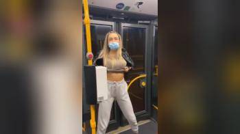 video of Flashing her tits in public transportation
