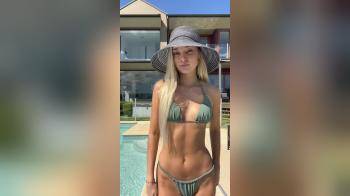 video of sun safe blonde poolside