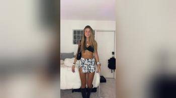 video of tanned brunette tiny skirt