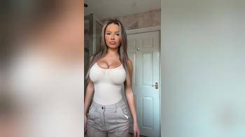 video of stuffs her tits in