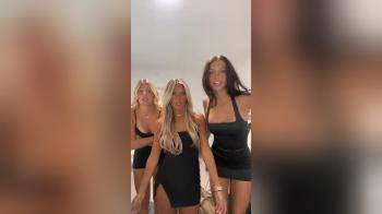 video of three girls black dresses