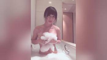 video of Fun asian girl in the bath