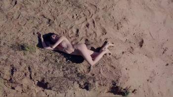 video of Fun naked girl in the sand