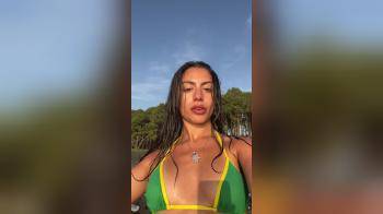 video of wet selfshot latina girl on the beach