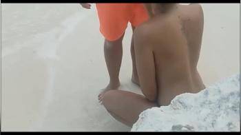 video of Public Blowjob on the Beach Cum on Tits