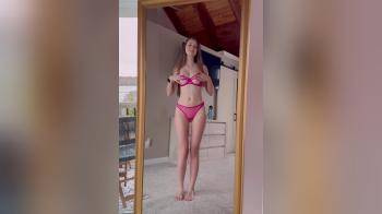 video of hottie strips in front of the mirror