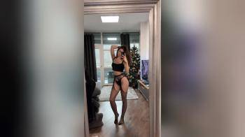 video of sexy brunette posing in black lingerie