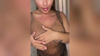 video of Beauty in chain link dress