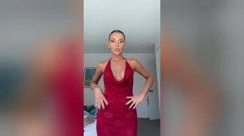 video of curvy brunette red dress