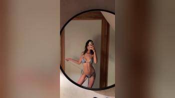 video of undoing her bikini bottoms