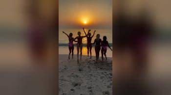 video of five thongs at sunset