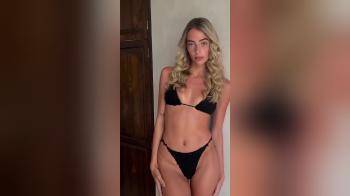 video of blonde in black bikini