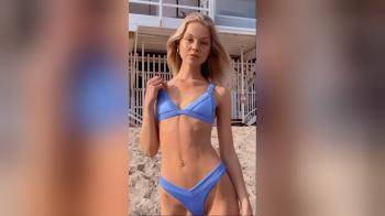 video of flat chested girl showing off her bikini and body