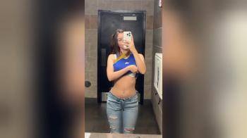 video of hottie reveals her tits in public bathroom