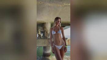 video of posing under the pier