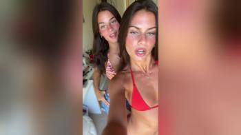 video of two brunettes spring break