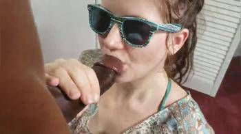 video of Hotwife in sunglasses sucks BBC to completion.