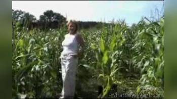 video of Simone flashing in corn field