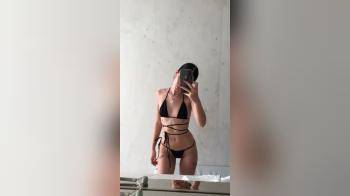 video of sexy young brunette posing in bikini