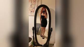 video of redhead showing up in sexy black dress