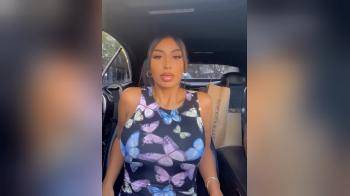 video of Exposing her big tits in the car