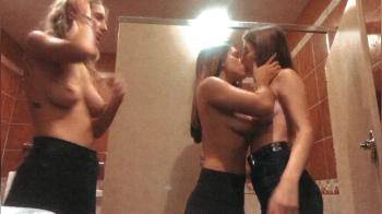 video of Topless twins sharing kisses with friend in hotel bathroom