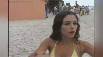 video of yellow bikini babe shows her tits