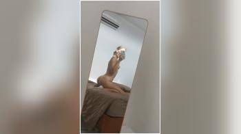 video of mirror selfie on the bed