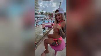 video of tits at the poolside bar