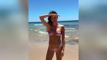 video of hot brunette on beach