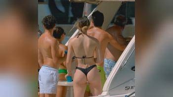 video of black bikini on boat