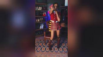 video of Hot babe in tartan skirt posing