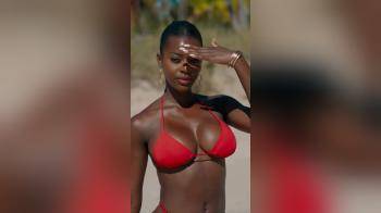 video of Sexy Black Babe In Red Bikini