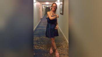 video of Mom strips nude and poses in the hotel hallway