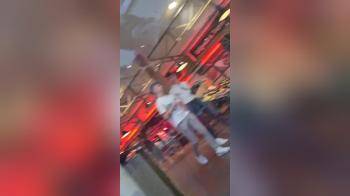 video of Red skirt escalator upskirt