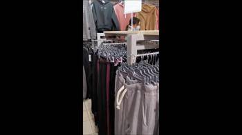 video of Blowjob in the Fitting Room of the Store next to the Security Guard