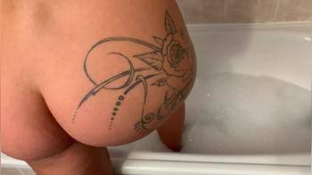 video of Hot blond taking a really hot bath